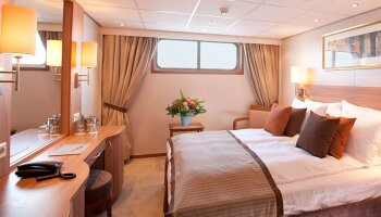 1548638503.487_c677_Viking River Cruises Viking Prestige Viking Legend Accommodation Standard Bedroom 1.jpg